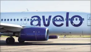  ?? Arnold Gold / Hearst Connecticu­t Media ?? An Avelo Airlines plane prepares to take off on the airline's inaugural flight from Tweed-New Haven Regional Airport to Orlando on Nov. 3, 2021.