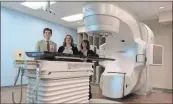  ?? / Tamara Wolk ?? Rees Skillern Cancer Institute, at 4700 Battlefiel­d Parkway, has added state-of-the-art radiation therapy to its services. From left: Radiation oncologist Dr. Ryan Cleary, and radiation therapists Bonnie Brown and Tracie Demo.