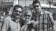  ?? COURTESY OF FAMILY ?? From left, Russell French, Paola French and their son, Kenneth French, at Universal Studios. Kenneth, 32, was shot and killed by an off-duty police officer in a Corona Costco on Friday.