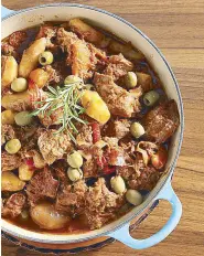  ??  ?? Beefing up an old favorite: Myrna Segismundo’s beef
kaldereta with green olives