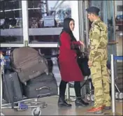  ?? HT FILE PHOTO ?? A CISF security official checks a passenger’s luggage at the IGI airport’s Terminal 3 in New Delhi.