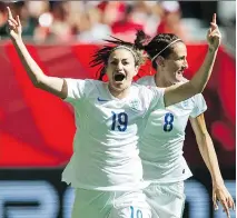  ?? GERRY KAHRMANN /POSTMEDIA NEWS ?? England’s Jodie Taylor, left, and Jill Scott celebrate Taylor’s goal against Canada in the quarter-final of the Women’s World Cup. England plays Japan in semifinal action Wednesday.