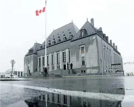  ?? SEAN KILPATRICK/THE CANADIAN PRESS ?? The Supreme Court of Canada is shown in Ottawa on Nov. 2. The validity of a law against internet luring will be reviewed by the court next year.