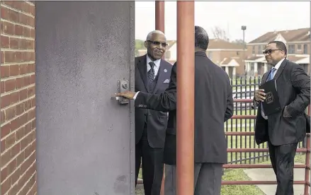  ?? BRAD VEST/THE COMMERCIAL APPEAL ?? Mayor A C Wharton arrives at the Foote Homes community center Thursday for an announceme­nt that the Memphis Housing Authority will receive a $3 million federal grant to land jobs for at least 60 low-income residents in the Foote Homes community, and...