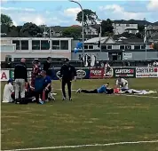  ?? STUFF ?? Auckland City forward David Browne and Tasman United goalkeeper Corey Wilson are attended on the field after a nasty head clash stopped the national league match at Kiwitea St in Auckland yesterday. Both players were stretchere­d off and taken to hospital.
