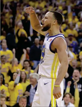  ?? ASSOCIATED PRESS ?? GOLDEN STATE WARRIORS GUARD STEPHEN CURRY (30) celebrates during the second half of Game 3 of the Western Conference Finals against the Houston Rockets in Oakland, Calif., Sunday.