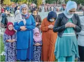  ?? AFP ?? People attend Eid Al-Fitr prayers outside the
Hagia Sophia Grand Mosque in Istanbul during a lockdown due to the COVID-19 pandemic.