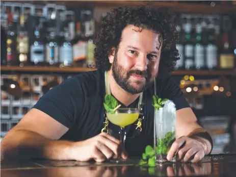  ?? Picture: ALIX SWEENEY ?? GREEN THUMB: Hooch and Fellow owner Josh Agostino with mint- based cocktails the South Side and the Mojito.