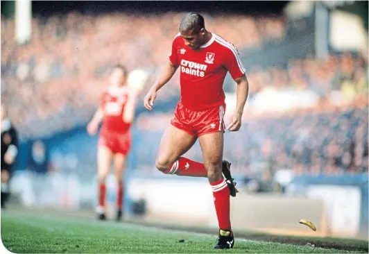  ??  ?? John Barnes treats racism with the contempt it deserves during a Merseyside derby at Goodison Park in 1988