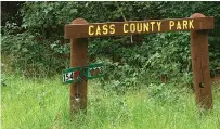  ??  ?? When you get to the Cass County Park, this is the big sign. Understate­d would be an understate­ment.