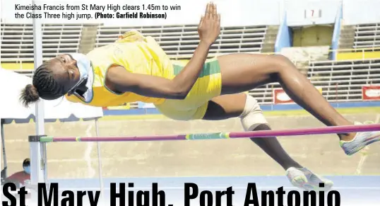  ?? (Photo: Garfield Robinson) ?? Kimeisha Francis from St Mary High clears 1.45m to win the Class Three high jump.