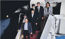  ?? AFP ?? US President Donald Trump and his wife Melania arrive in Washington with the three released American detainees