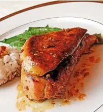  ??  ?? Chicken adobo enriched with foie gras