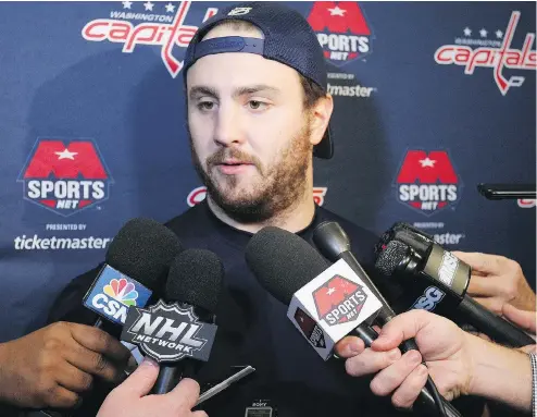  ?? BRUCE BENNETT / GETTY IMAGES ?? Defenceman Kevin Shattenkir­k speaks to the media on Tuesday ahead of his first game with the Washington Capitals.
