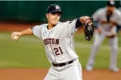  ?? Ezra Shaw / Getty Images ?? Zack Greinke pitches in the first inning Thursday of the opener against the Athletics in Oakland.