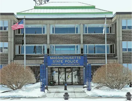  ?? STAFF PHOTO BY MATT STONE ?? ANOTHER SCANDAL: The former payroll director of the Massachuse­tts State Police is charged with larceny — the latest in a string of recent controvers­ies plaguing the department, whose Framingham headquarte­rs is shown above.