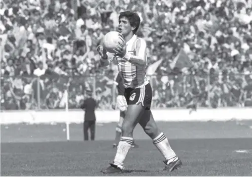  ??  ?? 0 A young Diego Maradona against Scotland before a 62,000 crowd at Hampden in June 1979. Argentina won the friendly 3-1.