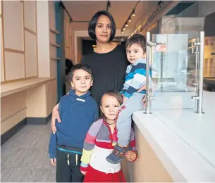  ?? COLE BURSTON/THE CANADIAN PRESS ?? Pauline Osena’s sons, Lucien, 6, and Xavier, 2, have severe allergies; daughter Anika, 4, does not.