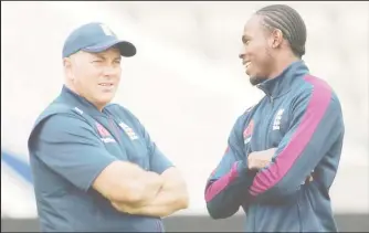  ?? (Reuters photo) ?? FLASHBACK! England’s Jofra Archer, rights talks with bowling coach Chris Silverwood during nets.