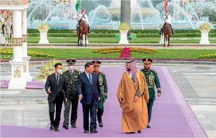  ?? AP ?? Chinese President Xi Jinping is greeted by Saudi Crown Prince and Prime Minister Mohammed bin Salman after his arrival at Al Yamama Palace in Riyadh. China is eyeing an opportunit­y to increase its influence in a region where the United States has long held greater sway.