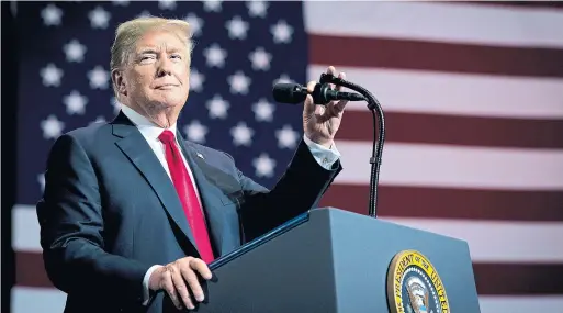  ?? DOUG MILLS/THE NEW YORK TIMES ?? “If you go out and you want to buy groceries, you need a picture on a card, you need ID,” U.S. President Donald Trump said at a recent rally held in Tampa, Fla.