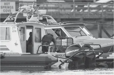  ?? CHAD HIPOLITO, THE CANADIAN PRESS ?? An RCMP dive team prepares to leave from Tofino to search for a missing person after a whale-watching boat capsized in 2015. Senator Colin Kenny says the next RCMP commission­er has to deal with chronic understaff­ing of the force and other serious issues.