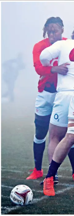  ??  ?? Pushing hard: Joe Launchbury and the England forwards are put through their paces at a foggy training session yesterday
