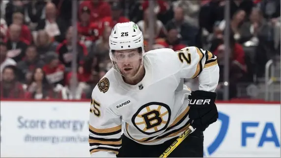  ?? CARLOS OSORIO — THE ASSOCIATED PRESS ?? Boston Bruins defenseman Brandon Carlo skates during the second period of a Nov. 4 game against the Red Wings in Detroit. He’s returning from a concussion.