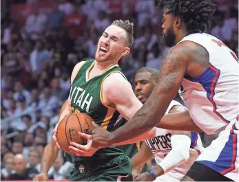  ?? JAYNE KAMIN-ONCEA, USA TODAY SPORTS ?? Jazz forward Gordon Hayward, left, averaged 23.7 points, 7.3 rebounds and 2.9 assists in the first-round series against the Clippers. The Jazz won 4-3.
