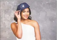  ?? Jennifer Pottheiser / WNBA ?? UConn’s Napheesa Collier poses with a Lynx hat after being chosen sixth overall by Minnesota in the WNBA draft Wednesday.