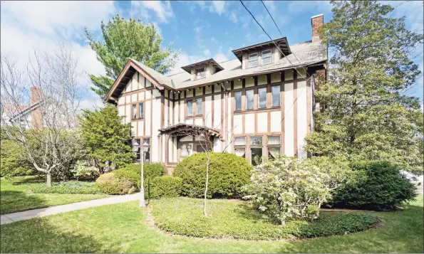  ?? Contribute­d photos ?? Sitting on a nicely landscaped half-acre lot, this half-timber home is a short bike ride to Yale University.