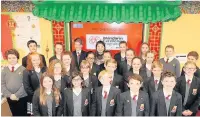  ??  ?? Mandarin teacher Aima Denby, middle of back row, with the Year 7 students on the Mandarin Excellence Programme at All Hallows