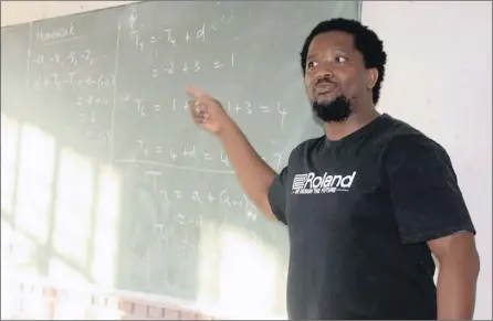  ??  ?? SELFLESS: Mavo Solomon has given up the riches of an engineerin­g career to teach rural and township schoolchil­dren maths and physical science in the Eastern Cape – for free!