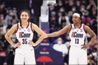  ?? Jessica Hill / Associated Press ?? UConn’s Azzi Fudd, left, and Christyn Williams in the first half of a game on Feb. 27 in Storrs.