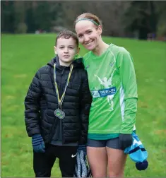  ??  ?? Wicklow Senior cross country champion Catherine O’Connor with her son, Jake.