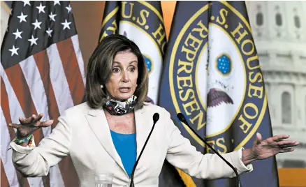  ?? SUSAN WALSH/AP ?? House Speaker Nancy Pelosi compared President Donald Trump to “the man who refuses to ask for directions” in dealing with the pandemic.