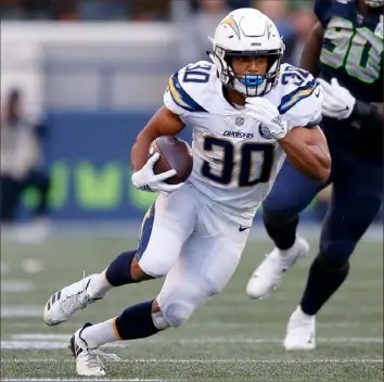  ?? Getty Images ?? Austin Ekeler has rushed for 409 yards when spelling Melvin Gordon.