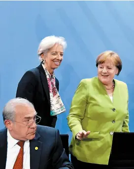  ??  ?? Lagarde, Merkel y Gurría en la reunión económica de Berlín.