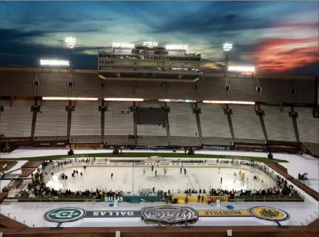  ?? Richard Rodriguez/Getty Images ?? The Nashville Predators practice on the Cotton Bowl ice Tuesday in anticipati­on for the Winter Classic in Dallas.