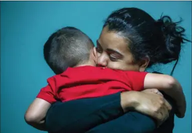  ?? STEPHEN SPILLMAN — THE ASSOCIATED PRESS ?? In this July 26, 2018 photo, Evelyn Zepeda cares for a four-year-old boy at her home in Austin, Texas. The boy’s adoptive mother and Zepeda’s biological mother, Josefina Ortiz Corrales, remains in an immigratio­n detention center in south Texas, while...