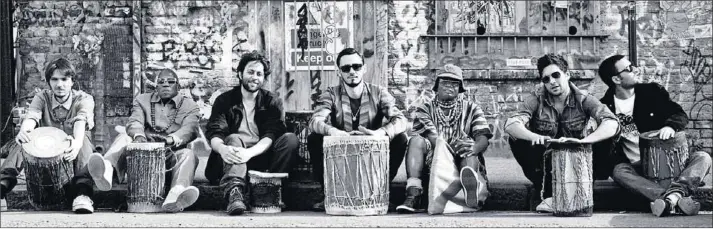  ??  ?? Electric beat: The Owiny Sigoma Band combine the rhythms of Kenyan Luo sounds with modern electronic­a