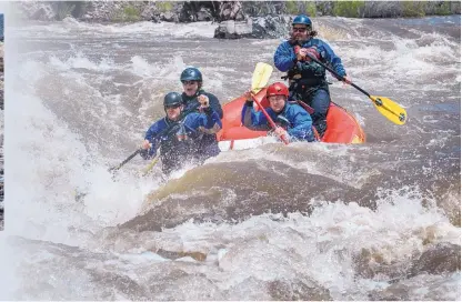  ?? EDDIE MOORE/JOURNAL ?? From left, Will Graves, Daisy Graves and Robert Bell, all with the Santa Fe Fire Department, and rafting instructor John Adams fight through a rapid known as the Toilet Bowl on Tuesday.