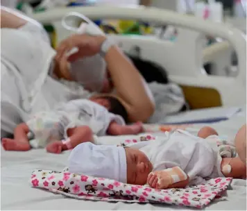  ?? JAM STA ROSA/AGENCE FRANCE-PRESSE ?? Leap-year babies Mothers stay with their precious newborns who were born on the rarest of days, 29 February.These little leap-year wonders bring an extra sprinkle of joy to a maternity hospital in Manila.