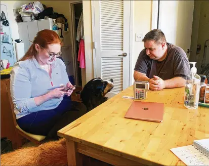  ?? PHOTOS BY ARTHUR ALLEN/KAISER HEALTH NEWS ?? Elizabeth Fisher Smith (with husband Matt and their dogs) has a rare medical disorder that forces her to rely on parenteral nutrition. Home and outpatient infusions are a growing business, but less profitable parts are strained.