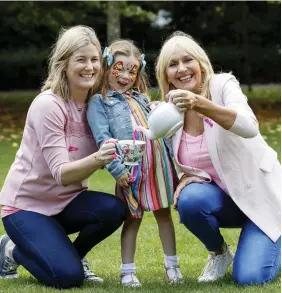  ??  ?? Breast cancer survivor Sarah Murray from Malahide and daughter Sadie (4) are pictured with RTÉ broadcaste­r Miriam O’Callaghan at the campaign launch