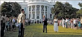  ?? PATRICK SEMANSKY/AP ?? President Trump and first lady Melania Trump at Saturday’s “Salute to America” event.