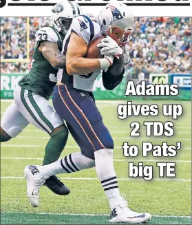  ?? Getty Images ?? THIRD TIME’S A CHARM? Jamal Adams fails to bring down Patriots tight end Rob Gronkowski on one of his two touchdowns Sunday.