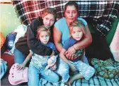  ?? Reuters ?? Maria Lila Meza Castro (right rear) and family at a temporary shelter in Tijuana.