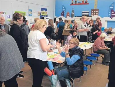  ?? Picture: Phil Hannah. ?? Parents at yesterday’s consultati­on on the potential closure of St Ninian’s.