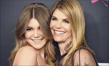  ?? Chris Pizzello / Associated Press ?? Olivia Jade Giannulli, left, the daughter of Lori Loughlin, right, and fashion designer Mossimo Giannulli, discussed on the Facebook Watch series Red Table Talk how she’s been affected by the college admissions scandal involving her parents.